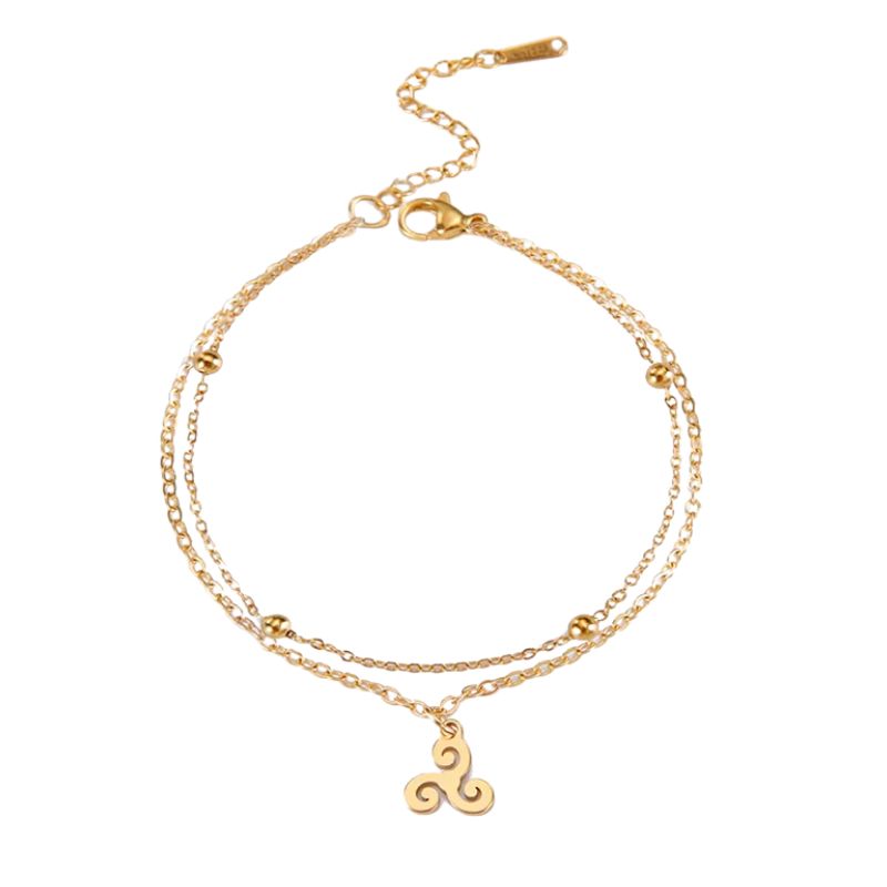 Bracelet Triskell en or avec double chaîne et pendentif en spirale